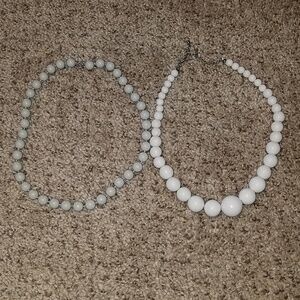 Two pair of costume jewelry pearl necklaces